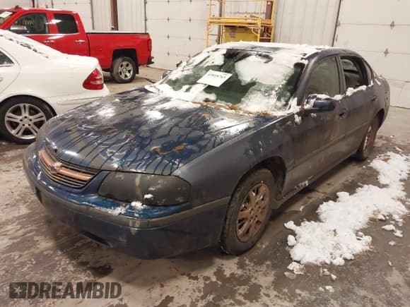 ✅ 2004 Chevrolet Impala • VIN: 2G1WF52E549293798 • Lot: 43818763. Listed on IAAI with 243,403 mi. Free auction sales archive from the USA and detailed vehicle history report at DreamBid. Image 2.