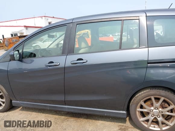 ✅ 2012 Mazda 5 Touring • VIN: JM1CW2CL5C0126744 • Lot: 42385667. Listed on IAAI with 140,150 mi. Free auction sales archive from the USA and detailed vehicle history report at DreamBid. Image 14.