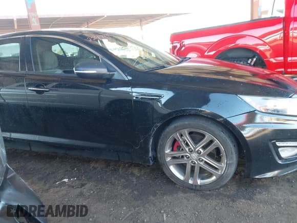 ✅ 2013 Kia Optima SX • VIN: 5XXGR4A64DG229784 • Lot: 43619404. Listed on IAAI with 126,103 mi. Free auction sales archive from the USA and detailed vehicle history report at DreamBid. Image 14.