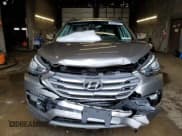 ✅ 2018 Hyundai Santa Fe 2.4L • VIN: 5NMZUDLB5JH069977 • Лот: 38550574. Опубликован ранее на Copart с пробегом 64 463 миль. Бесплатный доступ к архиву аукционных продаж из США и подробный отчёт об истории автомобиля на DreamBid. Изображение 5.