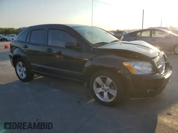 2012 Dodge Caliber SXT с VIN 1C3CDWDA5CD529551, выставлен на аукционе Copart как лот 71486254 с пробегом 204 969 миль миль и Списание • Salvage title. История ставок и продаж доступна на DreamBid. Изображение 4.