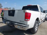 ✅ 2005 Nissan Titan LE • VIN: 1N6AA07BX5N573584 • Lot: 42709369. Listed on IAAI with 221,492 mi. Free auction sales archive from the USA and detailed vehicle history report at DreamBid. Image 4.