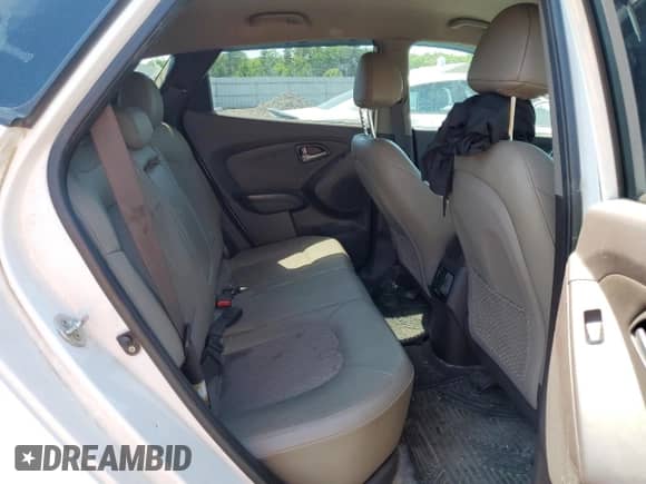 2015 Hyundai Tucson SE with VIN KM8JUCAG9FU102660, listed as a Copart auction lot 57199094 with 143,383 mi miles and Salvage title. Bid and sale history available at DreamBid. Image 11.