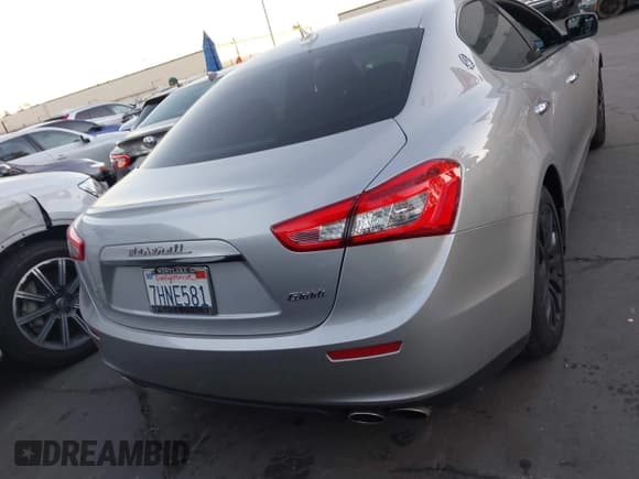 ✅ 2014 Maserati Ghibli • VIN: ZAM57XSA0E1105117 • Lot: 43917494. Listed on IAAI with 41,304 mi. Free auction sales archive from the USA and detailed vehicle history report at DreamBid. Image 16.