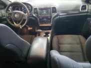 ✅ 2015 Jeep Grand Cherokee Laredo • VIN: 1C4RJFAG0FC834764 • Lot: 82690815. Listed on Copart with 67,519 mi. Free auction sales archive from the USA and detailed vehicle history report at DreamBid. Image 8.