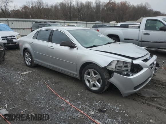 ✅ 2011 Chevrolet Malibu 1LS • VIN: 1G1ZB5E12BF234469 • Lot: 80911784. Listed on Copart with 228,949 mi. Free auction sales archive from the USA and detailed vehicle history report at DreamBid. Image 4.