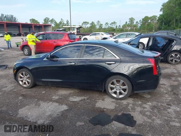 ✅ 2013 Cadillac ATS • VIN: 1G6AA5RX4D0174127 • Lot: 42619918. Listed on IAAI with 119,174 mi. Free auction sales archive from the USA and detailed vehicle history report at DreamBid. Image 14.