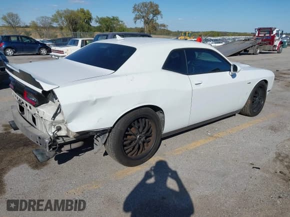 ✅ 2016 Dodge Challenger R/T Plus • VIN: 2C3CDZBT0GH177834 • Lot: 43396208. Listed on IAAI with 102,222 mi. Free auction sales archive from the USA and detailed vehicle history report at DreamBid. Image 4.