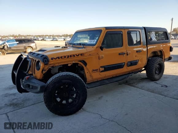 ✅ 2021 Jeep Gladiator Mojave • VIN: 1C6JJTEG2ML543516 • Lot: 91667495. Listed on Copart with 102,252 mi. Free auction sales archive from the USA and detailed vehicle history report at DreamBid. Image 1.