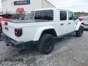 ✅ 2020 Jeep Gladiator Mojave • VIN: 1C6JJTEG7LL206581 • Lot: 41247922. Listed on IAAI with 27,876 mi. Free auction sales archive from the USA and detailed vehicle history report at DreamBid. Image 4.