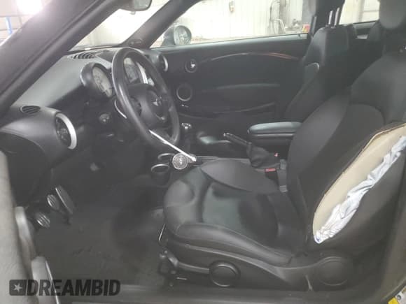✅ 2012 MINI Coupe S • VIN: WMWSX3C51CT408195 • Lot: 77008744. Listed on Copart with Not provided. Free auction sales archive from the USA and detailed vehicle history report at DreamBid. Image 7.