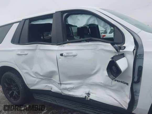 2023 Chevrolet Tahoe RST with VIN 1GNSKRKL5PR124079, listed as a IAAI auction lot 41389636 with 18,920 mi miles and . Bid and sale history available at DreamBid. Image 6.