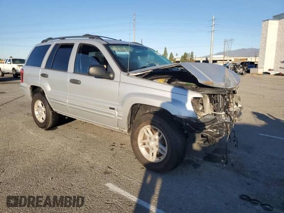 2004 Jeep Grand Cherokee Laredo с VIN 1J4GX48S54C385240, выставлен на аукционе Copart как лот 86716575 с пробегом 131 190 миль миль и Списание • Salvage title. История ставок и продаж доступна на DreamBid. Изображение 4.
