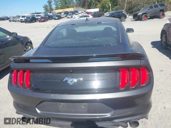 ✅ 2020 Ford Mustang EcoBoost Premium • VIN: 1FA6P8TH1L5170712 • Лот: 43477810. Опубликован ранее на IAAI с пробегом 59 337 миль. Бесплатный доступ к архиву аукционных продаж из США и подробный отчёт об истории автомобиля на DreamBid. Изображение 16.