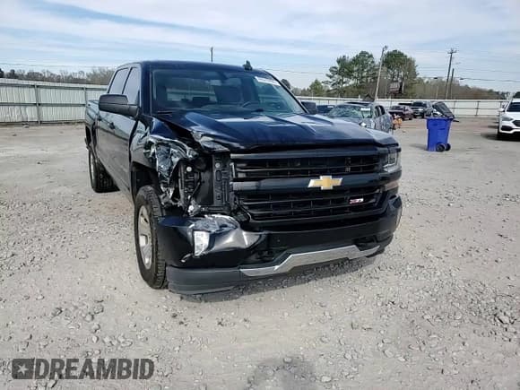 ✅ 2018 Chevrolet Silverado 1500 LT • VIN: 3GCUKRECXJG178045 • Лот: 49310205. Опубликован ранее на Copart с пробегом 129 142 миль. Бесплатный доступ к архиву аукционных продаж из США и подробный отчёт об истории автомобиля на DreamBid. Изображение 13.
