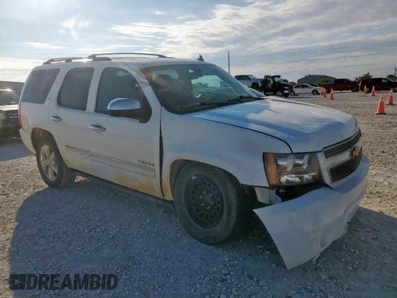 ✅ 2014 Chevrolet Tahoe LTZ • VIN: 1GNSCCE00ER106095 • Lot: 81633235. Listed on Copart with 311,501 mi. Free auction sales archive from the USA and detailed vehicle history report at DreamBid. Image 4.