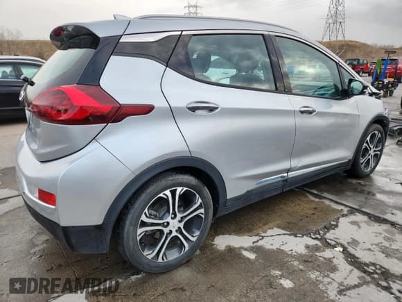 ✅ 2018 Chevrolet Bolt EV Premier • VIN: 1G1FX6S07J4138496 • Lot: 93329615. Listed on Copart with 74,402 mi. Free auction sales archive from the USA and detailed vehicle history report at DreamBid. Image 3.