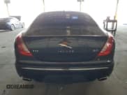 ✅ 2013 Jaguar XJ • VIN: SAJWA1C73D8V40604 • Лот: 71858365. Опубликован ранее на Copart с пробегом 103 006 миль. Бесплатный доступ к архиву аукционных продаж из США и подробный отчёт об истории автомобиля на DreamBid. Изображение 6.