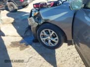 ✅ 2018 Chevrolet Equinox Premier • VIN: 3GNAXVEV0JL117543 • Lot: 43589922. Wystawiony na IAAI z przebiegiem 52 915 mil. Bezpłatny archiwum sprzedaży aukcyjnych z USA i szczegółowy raport historii pojazdu na DreamBid. Zdjęcie 6.