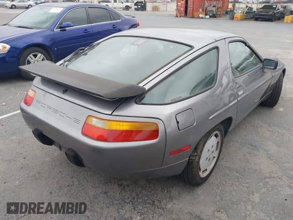 ✅ 1988 Porsche 928 • VIN: WP0JB0928JS860494 • Лот: 42195169. Опубликован ранее на IAAI с пробегом 77 844 миль. Бесплатный доступ к архиву аукционных продаж из США и подробный отчёт об истории автомобиля на DreamBid. Изображение 4.