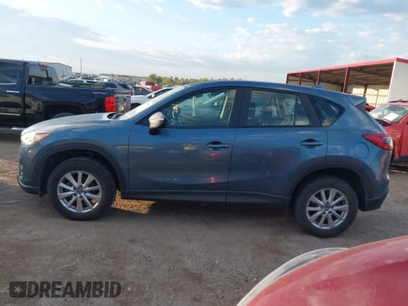 ✅ 2016 Mazda CX-5 Sport • VIN: JM3KE4BY4G0660953 • Лот: 43450266. Опубликован ранее на IAAI с пробегом 140 627 миль. Бесплатный доступ к архиву аукционных продаж из США и подробный отчёт об истории автомобиля на DreamBid. Изображение 14.