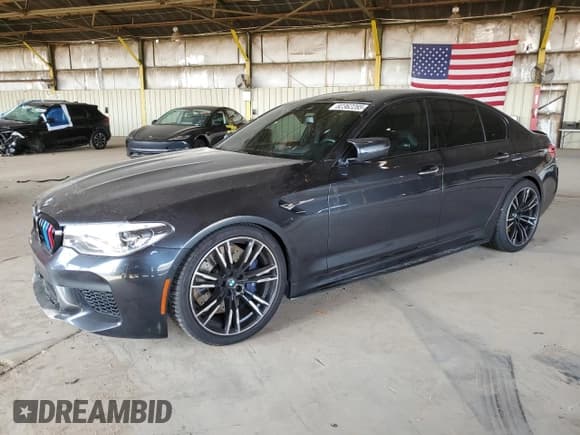 ✅ 2018 BMW M5 • VIN: WBSJF0C52JB283137 • Lot: 82362285. Listed on Copart with 69,963 mi. Free auction sales archive from the USA and detailed vehicle history report at DreamBid. Image 1.