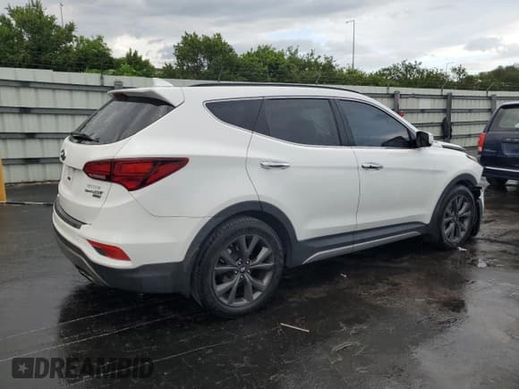 ✅ 2018 Hyundai Santa Fe Ultimate • VIN: 5XYZW4LA9JG537852 • Лот: 81812715. Опубликован ранее на Copart с пробегом 124 269 миль. Бесплатный доступ к архиву аукционных продаж из США и подробный отчёт об истории автомобиля на DreamBid. Изображение 3.