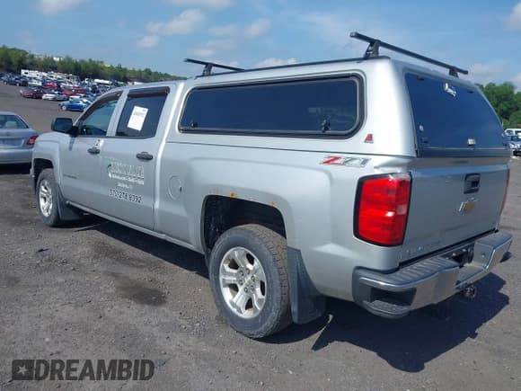 ✅ 2014 Chevrolet Silverado 1500 LT • VIN: 1GCUKREC8EF194719 • Lot: 42603572. Wystawiony na IAAI z przebiegiem 133 599 mil. Bezpłatny archiwum sprzedaży aukcyjnych z USA i szczegółowy raport historii pojazdu na DreamBid. Zdjęcie 3.