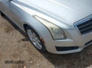 ✅ 2014 Cadillac ATS Standard RWD • VIN: 1G6AA5RA1E0104839 • Lot: 42383432. Wystawiony na IAAI z przebiegiem 142 701 mil. Bezpłatny archiwum sprzedaży aukcyjnych z USA i szczegółowy raport historii pojazdu na DreamBid. Zdjęcie 6.