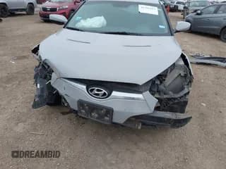 ✅ 2013 Hyundai Veloster w/Black Int • VIN: KMHTC6AD0DU157420 • Lot: 41381813. Wystawiony na IAAI z przebiegiem 163 204 mil. Bezpłatny archiwum sprzedaży aukcyjnych z USA i szczegółowy raport historii pojazdu na DreamBid. Zdjęcie 6.