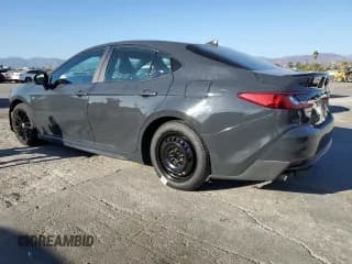 ✅ 2025 Toyota Camry LE • VIN: 4T1DAACK4SU044401 • Лот: 85108165. Опубликован ранее на Copart с пробегом 59 667 миль. Бесплатный доступ к архиву аукционных продаж из США и подробный отчёт об истории автомобиля на DreamBid. Изображение 2.