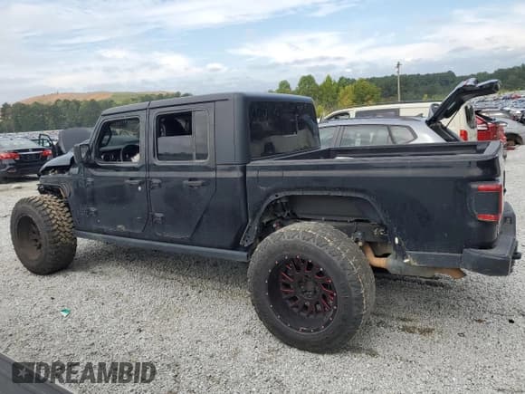 ✅ 2021 Jeep Gladiator Willys • VIN: 1C6HJTAG3ML571104 • Lot: 84027255. Listed on Copart with 91,135 mi. Free auction sales archive from the USA and detailed vehicle history report at DreamBid. Image 2.