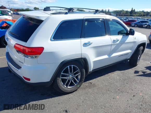 2018 Jeep Grand Cherokee Sterling z VIN 1C4RJFBGXJC267146, wystawiony jako IAAI lot #43411533 z przebiegiem 58 843 mil mil oraz . Historia ofert i sprzedaży dostępna na DreamBid. Obrazek 4.