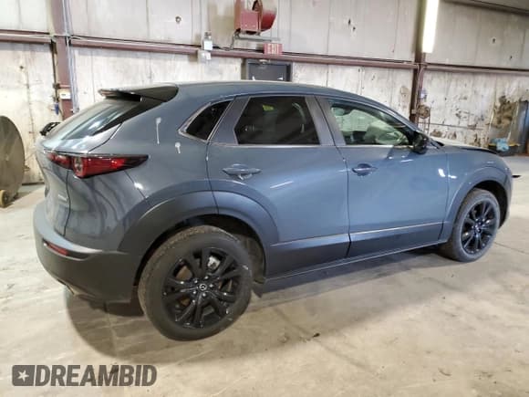 ✅ 2024 Mazda CX-30 S Carbon Edition • VIN: 3MVDMBCM3RM650546 • Lot: 56434415. Listed on Copart with 35,574 mi. Free auction sales archive from the USA and detailed vehicle history report at DreamBid. Image 3.