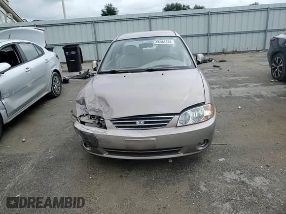 ✅ 2003 Kia Spectra • VIN: KNAFB121735291116 • Lot: 66861134. Listed on Copart with 167,222 mi. Free auction sales archive from the USA and detailed vehicle history report at DreamBid. Image 11.