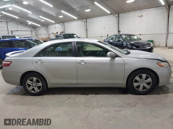 ✅ 2007 Toyota Camry LE • VIN: 4T1BE46K77U032307 • Lot: 43510241. Listed on IAAI with 91,927 mi. Free auction sales archive from the USA and detailed vehicle history report at DreamBid. Image 14.