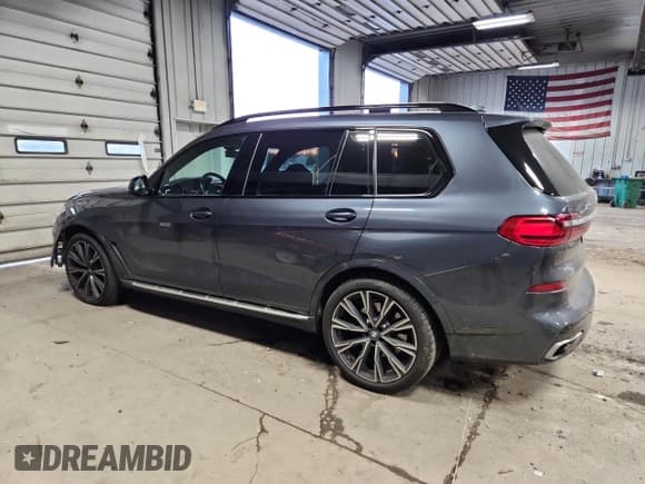✅ 2021 BMW X7 xDrive40i • VIN: 5UXCW2C00M9F02965 • Лот: 92995675. Опубликован ранее на Copart с пробегом 52 090 миль. Бесплатный доступ к архиву аукционных продаж из США и подробный отчёт об истории автомобиля на DreamBid. Изображение 2.