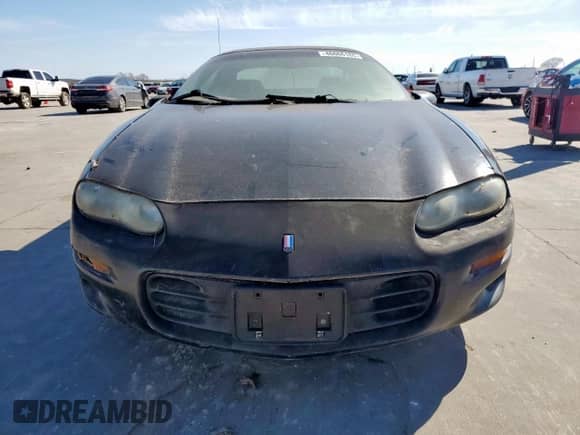 2002 Chevrolet Camaro z VIN 2G1FP22K722132425, wystawiony jako Copart lot #46666165 z przebiegiem 214 580 mil mil oraz Czysty tytuł • Clean title. Historia ofert i sprzedaży dostępna na DreamBid. Obrazek 5.