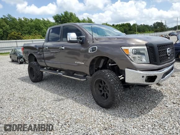 ✅ 2017 Nissan Titan SL • VIN: 1N6BA1F27HN547900 • Лот: 61768145. Опубликован ранее на Copart с пробегом 148 383 миль. Бесплатный доступ к архиву аукционных продаж из США и подробный отчёт об истории автомобиля на DreamBid. Изображение 4.