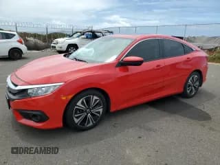 ✅ 2018 Honda Civic EX-L • VIN: JHMFC1F82JX013716 • Лот: 61294755. Опубликован ранее на Copart с пробегом 27 577 миль. Бесплатный доступ к архиву аукционных продаж из США и подробный отчёт об истории автомобиля на DreamBid. Изображение 1.