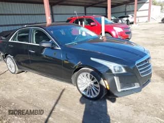 ✅ 2016 Cadillac CTS Luxury Collection AWD • VIN: 1G6AX5SX3G0171958 • Лот: 43582288. Опубликован ранее на IAAI с пробегом 152 132 миль. Бесплатный доступ к архиву аукционных продаж из США и подробный отчёт об истории автомобиля на DreamBid. Изображение 1.