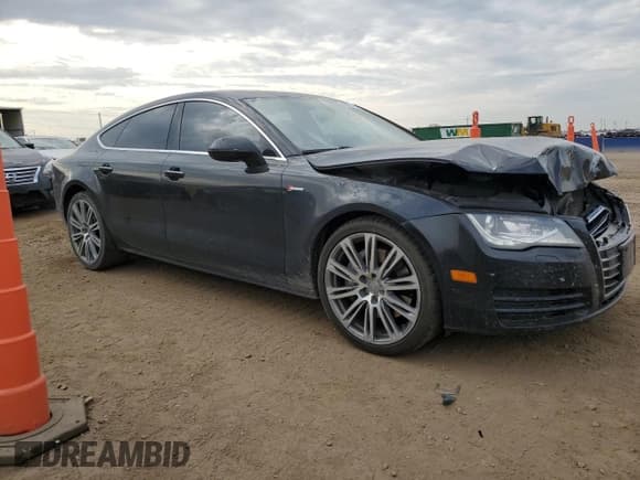 ✅ 2014 Audi A7 Premium Plus • VIN: WAUWGAFCXEN018266 • Лот: 69325185. Опубликован ранее на Copart с пробегом 200 046 миль. Бесплатный доступ к архиву аукционных продаж из США и подробный отчёт об истории автомобиля на DreamBid. Изображение 4.