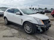✅ 2013 Cadillac SRX Performance Collection • VIN: 3GYFNHE36DS521908 • Lot: 65402415. Listed on Copart with 124,799 mi. Free auction sales archive from the USA and detailed vehicle history report at DreamBid. Image 4.