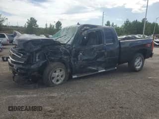 2013 Chevrolet Silverado 1500 LTZ with VIN 1GCRKTE79DZ340922, listed as a Copart auction lot 64622685 with 179,159 mi miles and Salvage title. Bid and sale history available at DreamBid. Image 1.