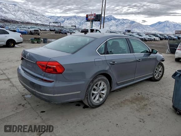 ✅ 2016 Volkswagen Passat S • VIN: 1VWAT7A33GC041693 • Lot: 94745355. Listed on Copart with 131,116 mi. Free auction sales archive from the USA and detailed vehicle history report at DreamBid. Image 3.