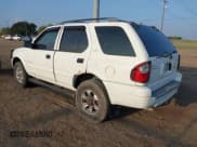 ✅ 2000 Isuzu Rodeo S • VIN: 4S2CK58W1Y4323057 • Lot: 43357739. Listed on IAAI with 147,414 mi. Free auction sales archive from the USA and detailed vehicle history report at DreamBid. Image 3.