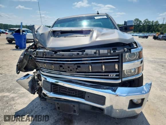 2017 Chevrolet Silverado 2500HD LTZ с VIN 1GC1KWEY4HF156440, выставлен на аукционе Copart как лот 71732905 с пробегом 180 327 миль миль и Списание • Salvage title. История ставок и продаж доступна на DreamBid. Изображение 5.