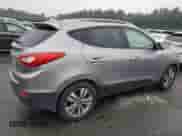 2014 Hyundai Tucson SE z VIN KM8JU3AG8EU948373, wystawiony jako Copart lot #81754305 z przebiegiem 227 555 mil mil oraz Czysty tytuł • Clean title. Historia ofert i sprzedaży dostępna na DreamBid. Obrazek 3.