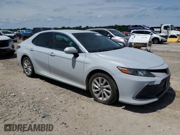 2022 Toyota Camry LE с VIN 4T1R11BK7NU055288, выставлен на аукционе Copart как лот 67012075 с пробегом 106 728 миль миль и Списание • Salvage title. История ставок и продаж доступна на DreamBid. Изображение 4.