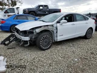✅ 2017 Ford Fusion Hybrid Titanium • VIN: 3FA6P0RU7HR187914 • Lot: 82234005. Listed on Copart with 290,959 mi. Free auction sales archive from the USA and detailed vehicle history report at DreamBid. Image 1.